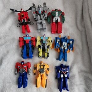 Transformers EarthSpark 1 Step Flip Changer lot of 9 complete Hasbro 2023
